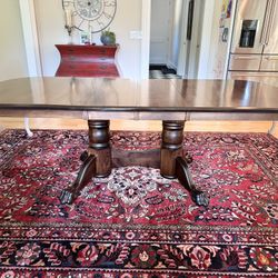 Gorgeous solid wood extendable custom dining table from Shipshewana with 4 leafs