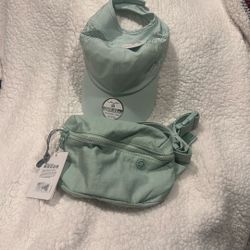 brand new fanny pack and pony tail hat 