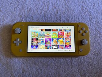 NINTENDO SWITCH LITE with 50 POPULAR SWITCH GAMES