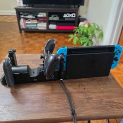 Charging Dock for Nintendo Switch,charges up to 4 Joy-cons, 2 Pro Controllers, and has 2 USB ports.