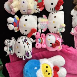 7 Hello Kitty Plushies 