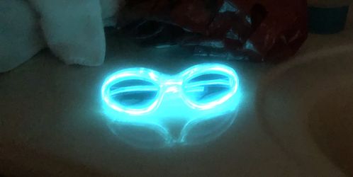 FIRM PRICE BRAND NEW LIGHT UP SUNGLASSES