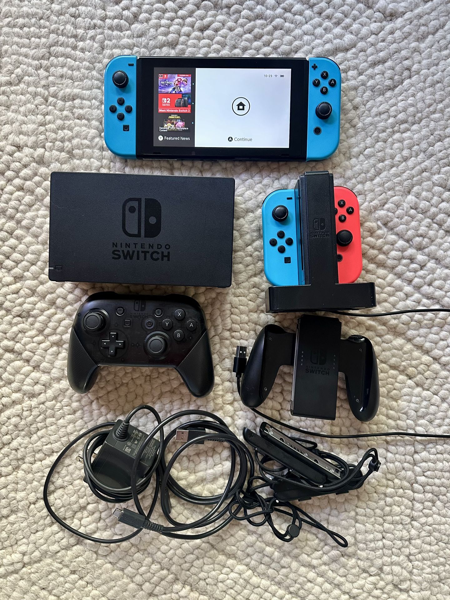 Nintendo Switch with accessories and 9 games / case / charger / pro controller