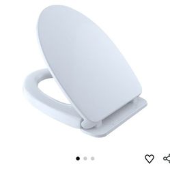 7380: New TOTO SoftClose Slow Close Elongated Toilet Seat and Lid, Cotton White - SS124#01
