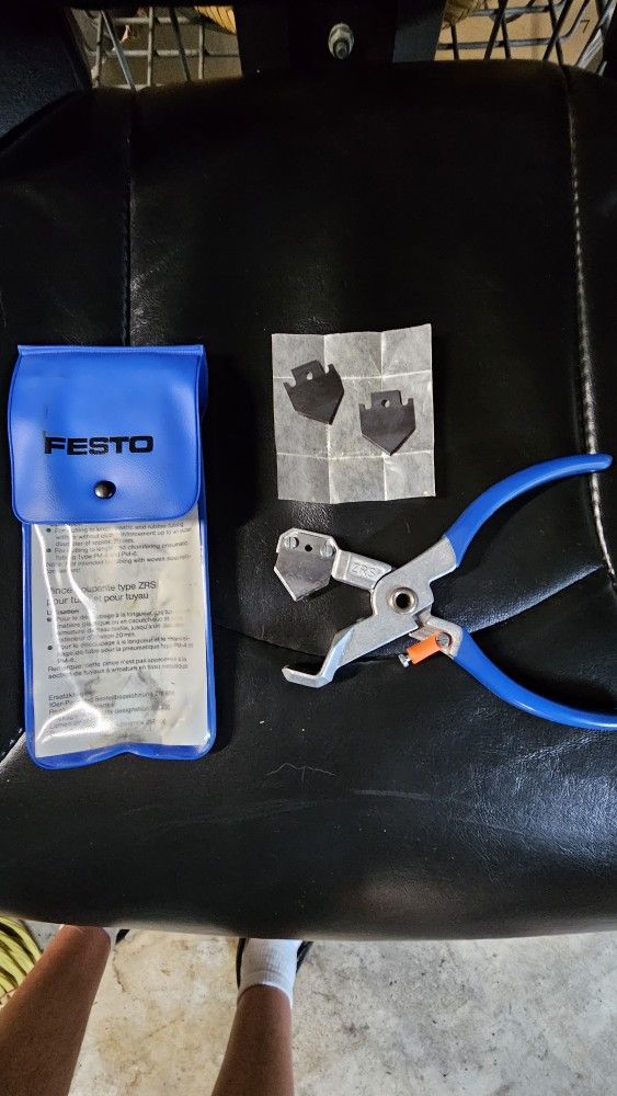 Tube cutter, scissors.
