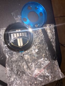 This is a DUB Wheels Floater Spinner Center Cap (part number 1002-35 or 1002-01)