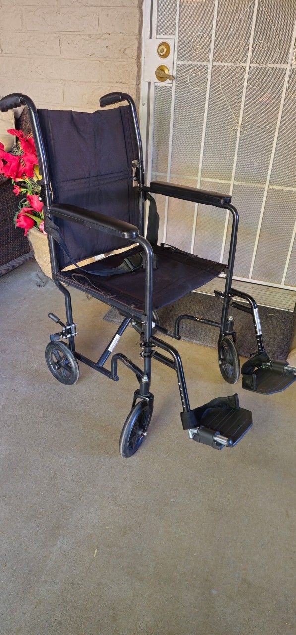 ** Novoa Manual Transport Wheelchair **