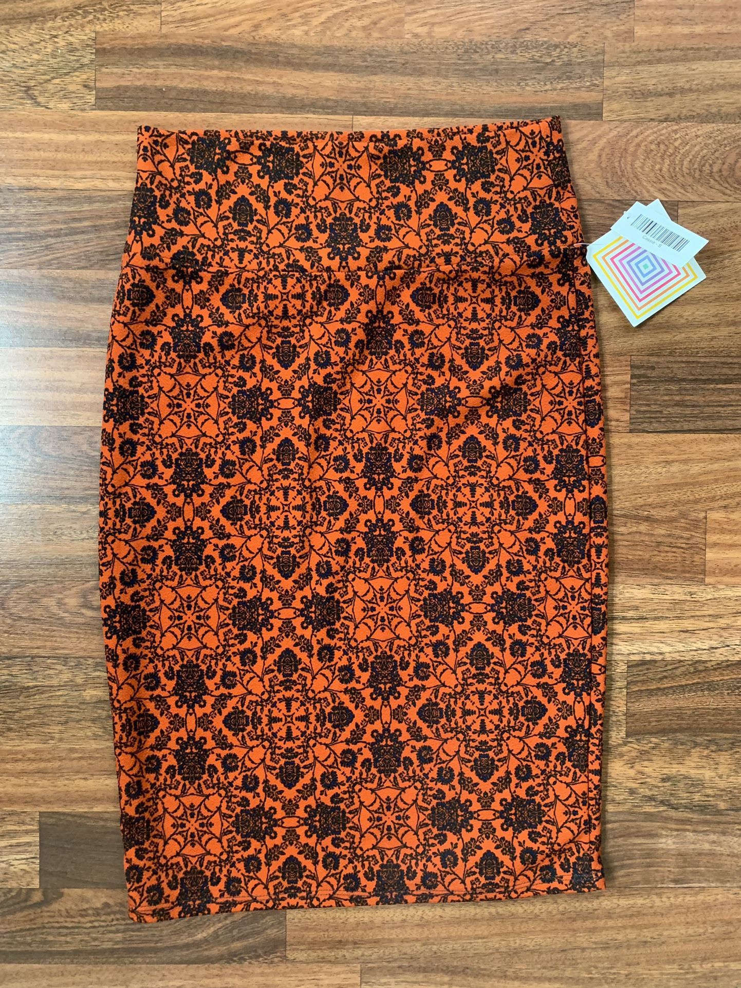 Lularoe Cassie Burnt Orange Skirt With Black Floral Detail Size Small. NWT