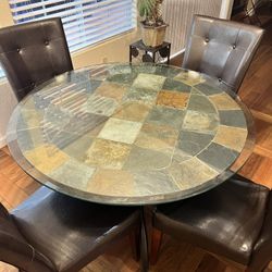 Custom Stone Table With Glass Top and 4 chairs