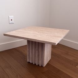 CB2 Carve Travertine cocktail Table 