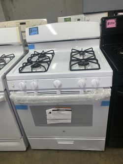 New GE gas range with 6 months warranty