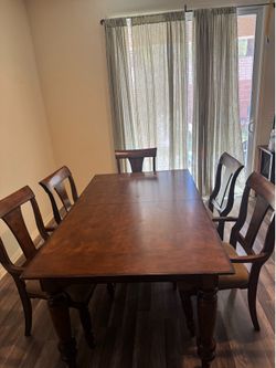 Wood dining table with leaf extender