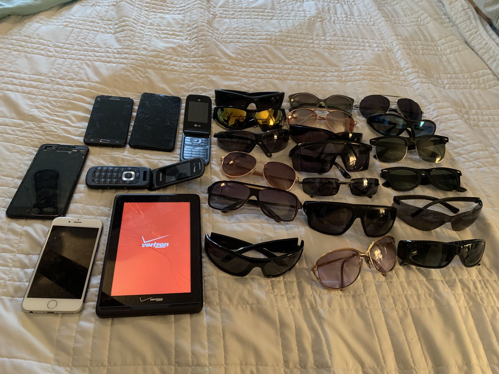 Trade- IPhone 7plus (locked), Iphone6 quit working, LG, Samsung 5, and19 used sunglasses. Some are high end glasses by Arnette, Erron,Bomber,Stache,A