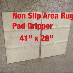 Non-slip  area  rug  pad gripper  -  $10 (for 2)