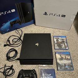 PS4 Pro 1TB Bundle – 2 Controllers + 2 Sealed Games + Box