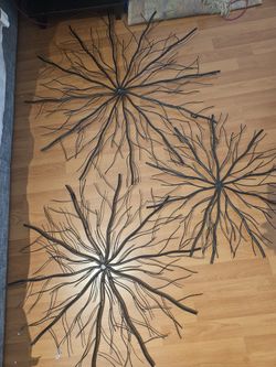Litton lane caspian Black metal starburst wall decor