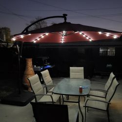 Hampton Bay 11 ft. LED Round Offset Outdoor Patio Umbrella in Chili  Red......NEW $200 FIRM for Sale in Upland, CA - OfferUp