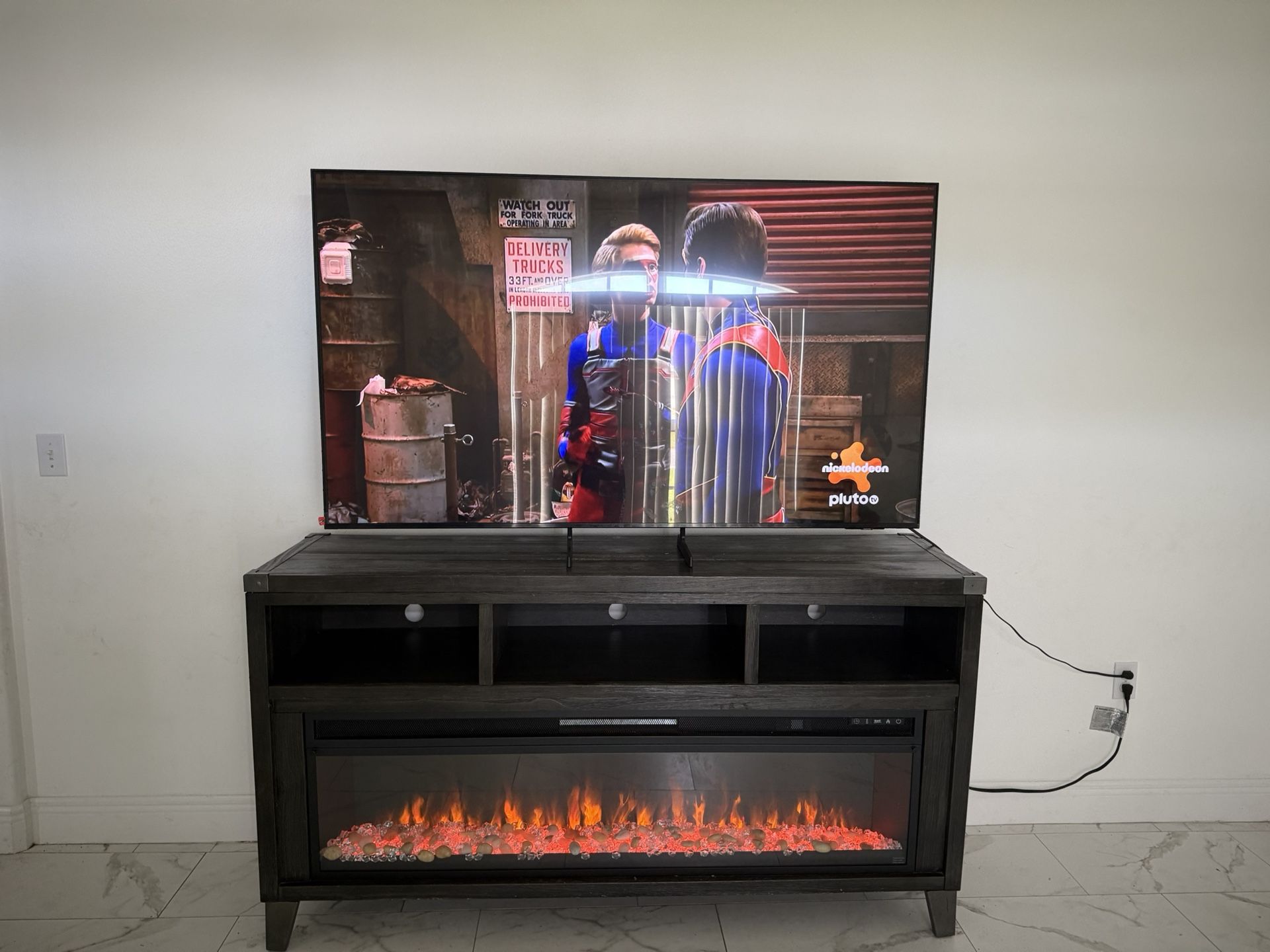 75” Samsung Smart Tv With Fire Place/tv Stand 