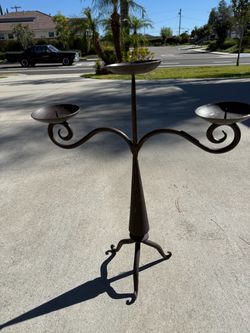 Iron candle holder
