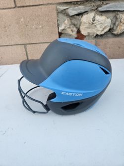 Easton Ghost Two-Tone Matte Fastpitch Softball Batting Helmet with an integrated facemask in a carolina blue and charcoal