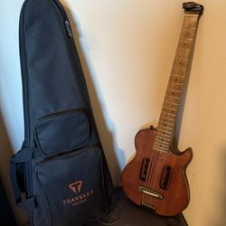 Traveler Guitar With Case And Headphones
