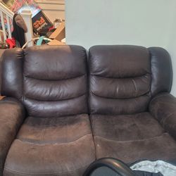 Two Leather Love Seat Recliners