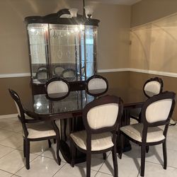 Dining Room table, extension leaf, 6 chairs, & hutch