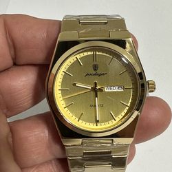 Men watch  gold color   $45