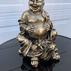 Laughing On A Turtle Statue