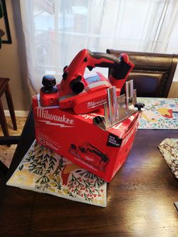 Milwaukee 18V Lithium-Ion Cordless 3-1/4 in. Planer (Tool-Only)open box never used.