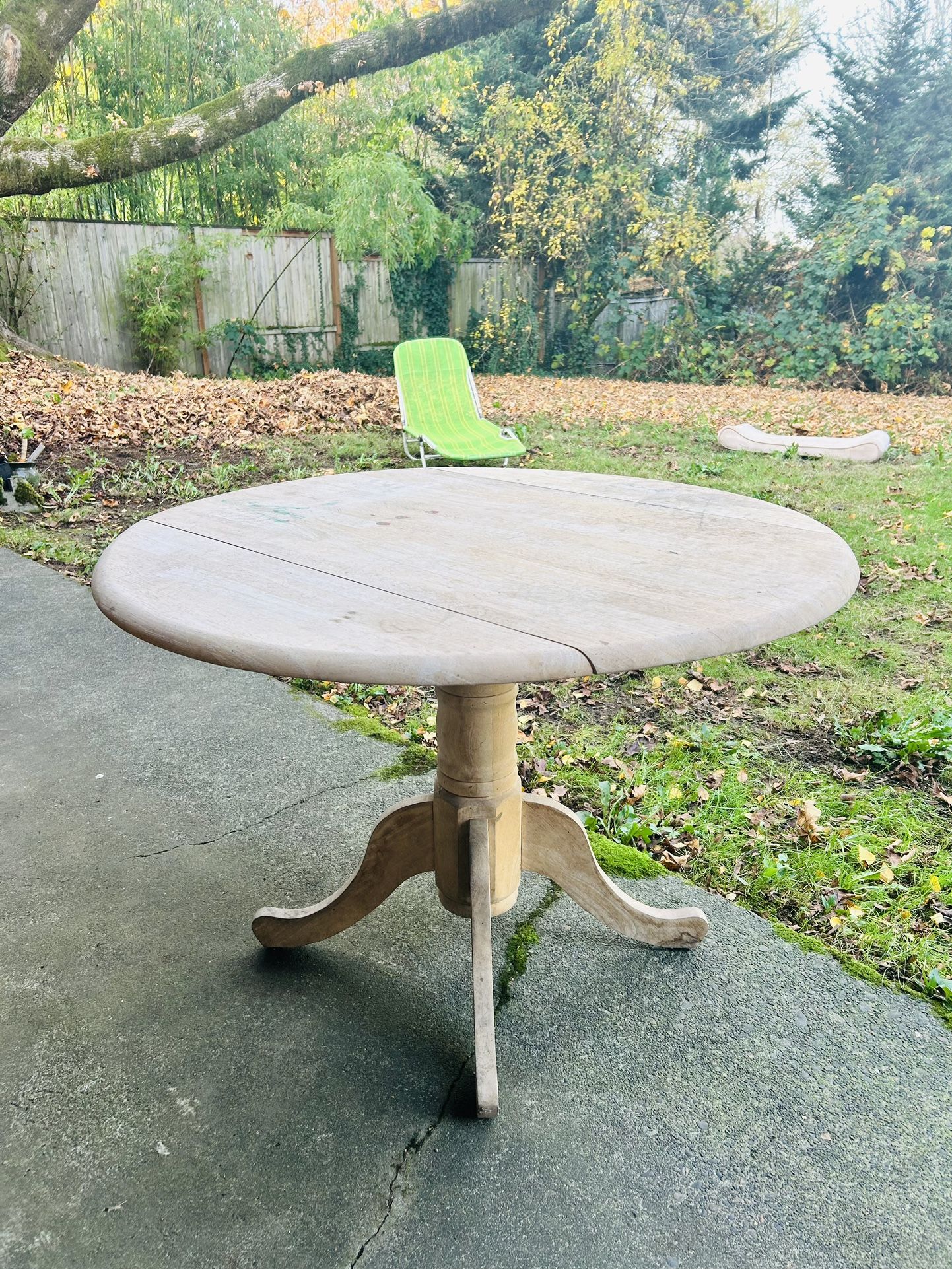 Wooden “drop-leaf” Round Dining Table