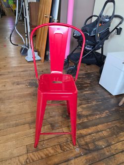 Red metal tolix style bar stool