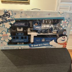 The Grand Arctic Express featuring Frosty the Snowman. Includes 12 feet of track. New in box!