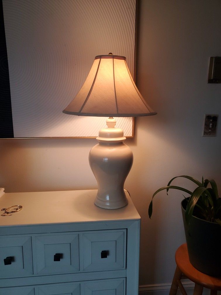 Beautiful  Cream colored lamp measures  26 inches high