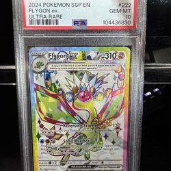 2024 POKEMON SSP EN-SURGING SPARKS 222 FLYGON EX ULTRA RARE PSA 10