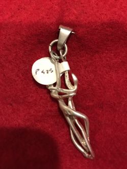 Embraced couple pendant
