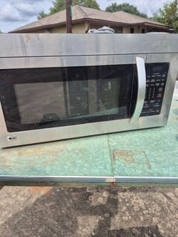 MICROWAVE VENTED ABOVE STOVE