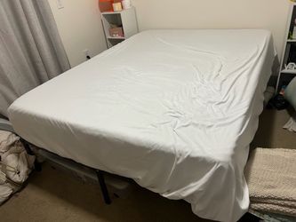 Queen Mattress on Metal Bed Frame