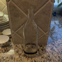 vintage intravenous (IV) fluid bottle manufactured by Hospital Liquids, Inc. around 1942.