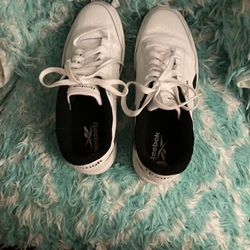 Reebok: White Leather Tennis Shoe W/Black Lettering 