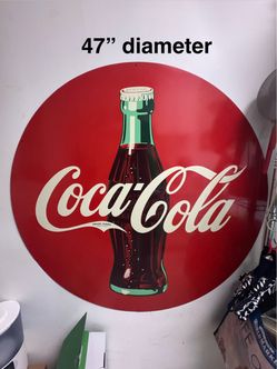 Vintage tin Coca-Cola sign