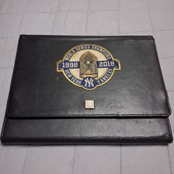 IPad used but working condition. Nothing wrong with it.  Am including a custom Yankee legends replica autographed binder with authentic  commemorative