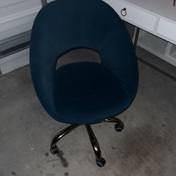 White Desk And Teal Rolling Chair