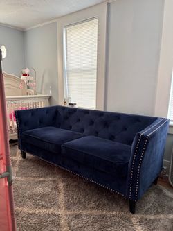 Blue velvet couch