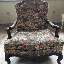 Vintage upholstered arm chair (42” tall x 25” D x 34” W)