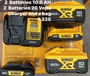 4 Dewalt batteries and chargers bag