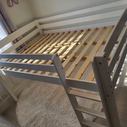 White Wooden Low Loft Style Bed With Ladder. Comes With Full Size Mattress In Plastic Protector Bag. Good Condition But Used