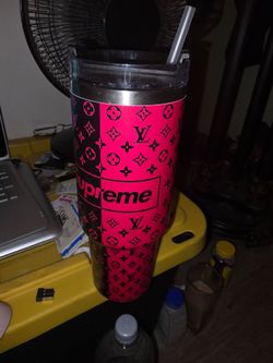 Supreme drink holder with straw