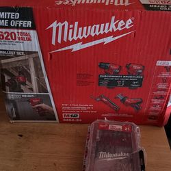 Milwaukee m12 four tool kit with 2 batteries charger and case