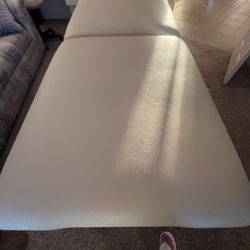 Massage table